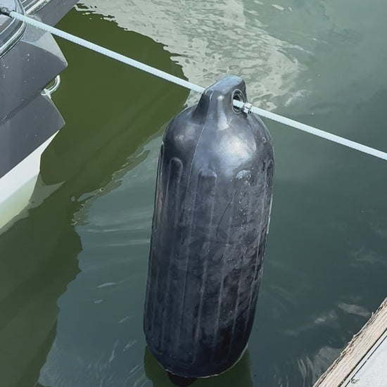 Bumper Shock video: silver shock line holding a marine bumper between a boat and the dock